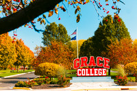 Fall 2023 Students-Campus Photoshoots Grace College Red Sign P01759-5