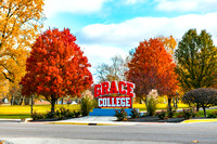 Fall 2023 Students-Campus Photoshoots Grace College Red Sign P01759-1