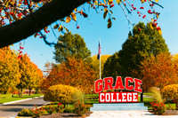 Fall 2023 Students-Campus Photoshoots Grace College Red Sign P01759-6